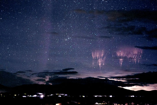 Dancing sprites, majestic emanations of light that flash for an instant high above the thunderheads, over Colorado. Image Credit: Thomas Ashcraft